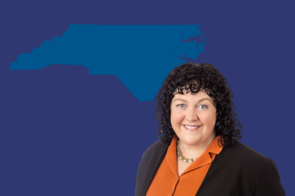 Shannon Poll, Director of YPTC's Raleigh-Durham office, pictured in front out outline of North Carolina representing YPTC's accounting for nonprofits and fractional CFO services in the Raleigh-Durham area